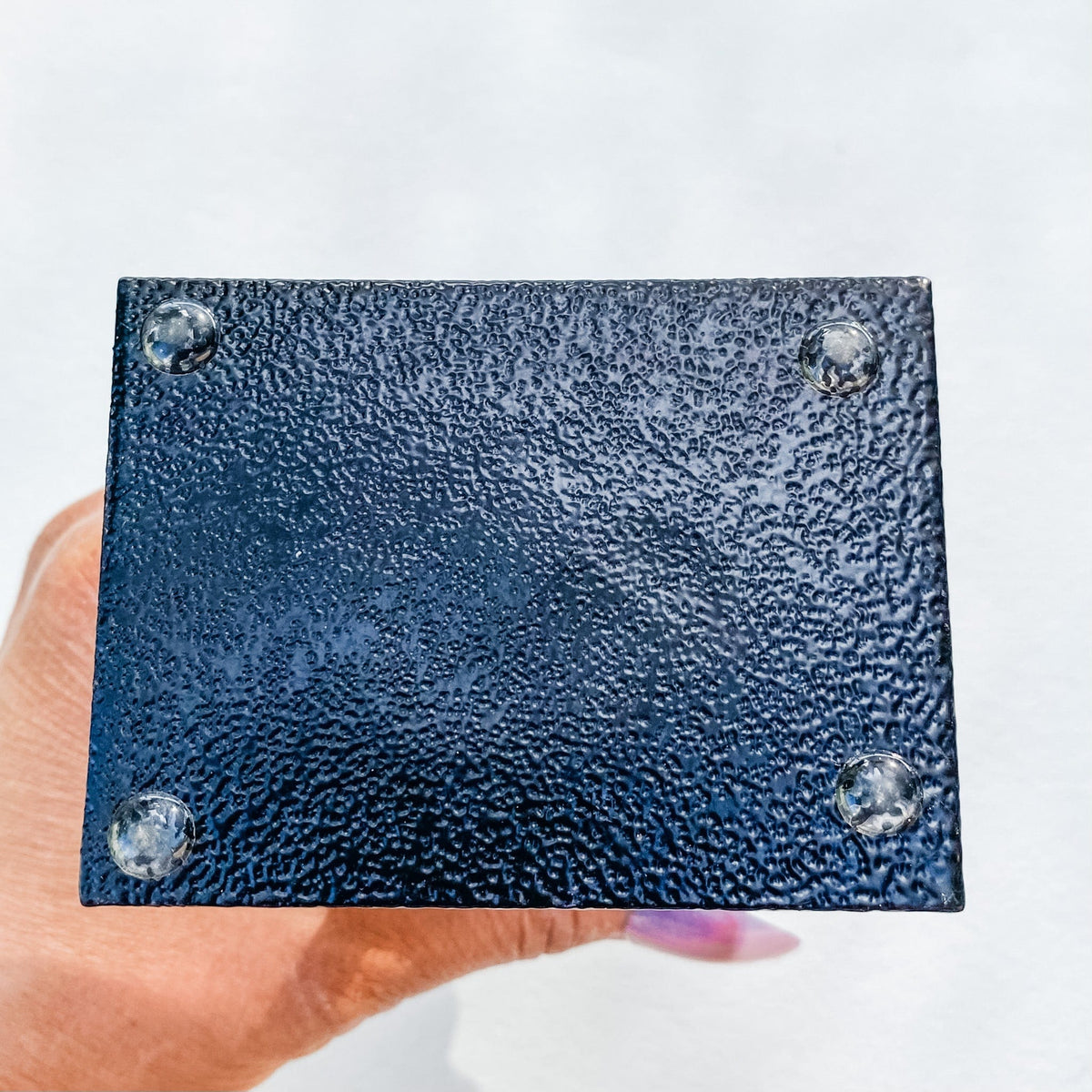 S1766 Raw Emerald crystal stone on black metal stand australia. emerald on a stand home office decor australia. gemrox sydney 1