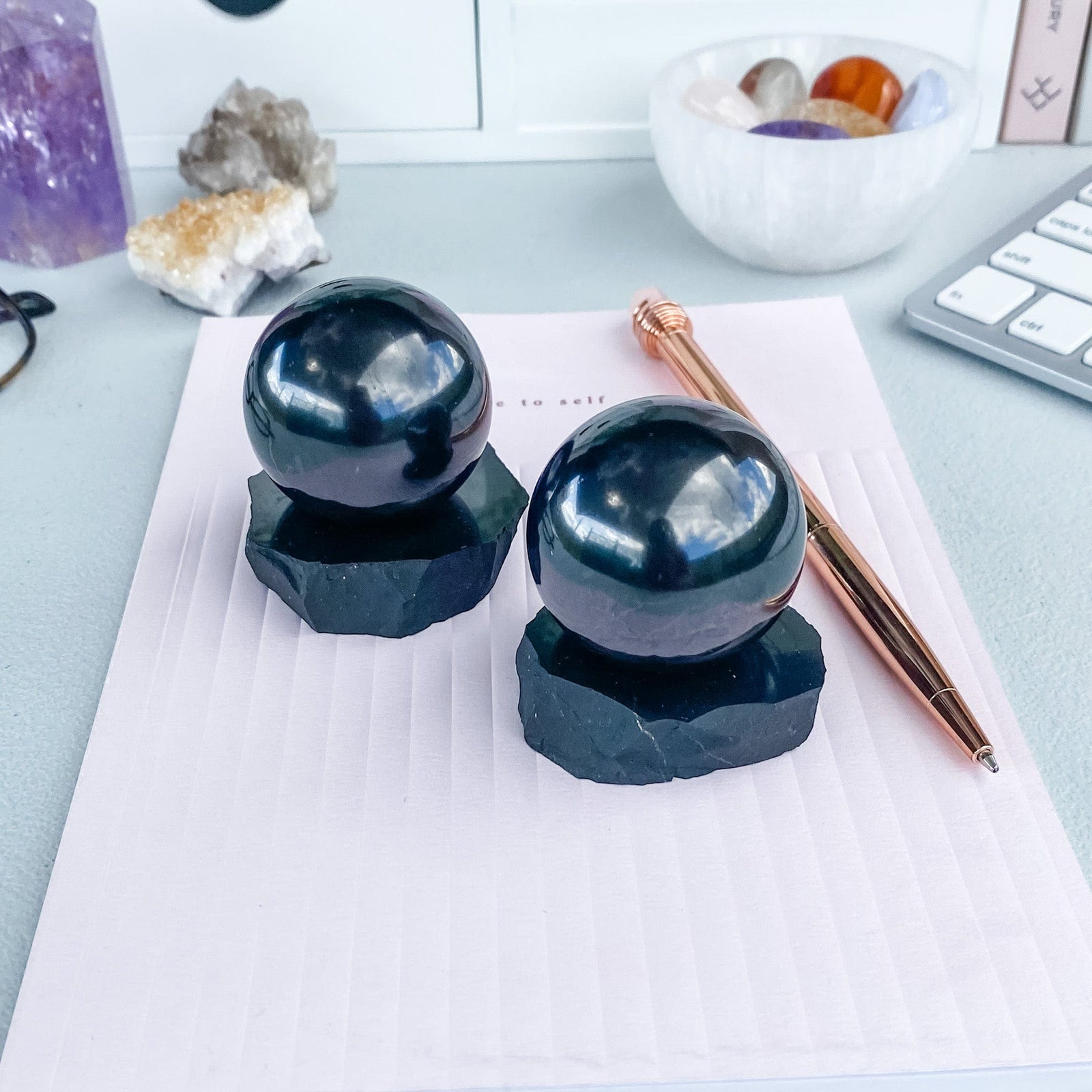 S1787 Shungite crystal sphere stand for emf protection.emf protection shungite stone for desk or workspace australia. gemrox sydney 1