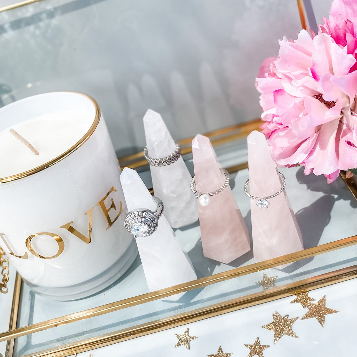 Rose quartz crystal ring stand ring holder tower point generator gemrox australia