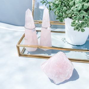 Rose quartz crystal ring stand ring holder tower point generator gemrox australia