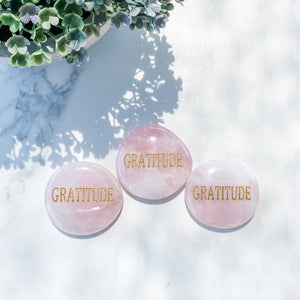 s1473 rose quartz crystal palm stone engraved with gold word gratitude australia. rose quartz palm stone inspirational wording australia gemrox sydney 1