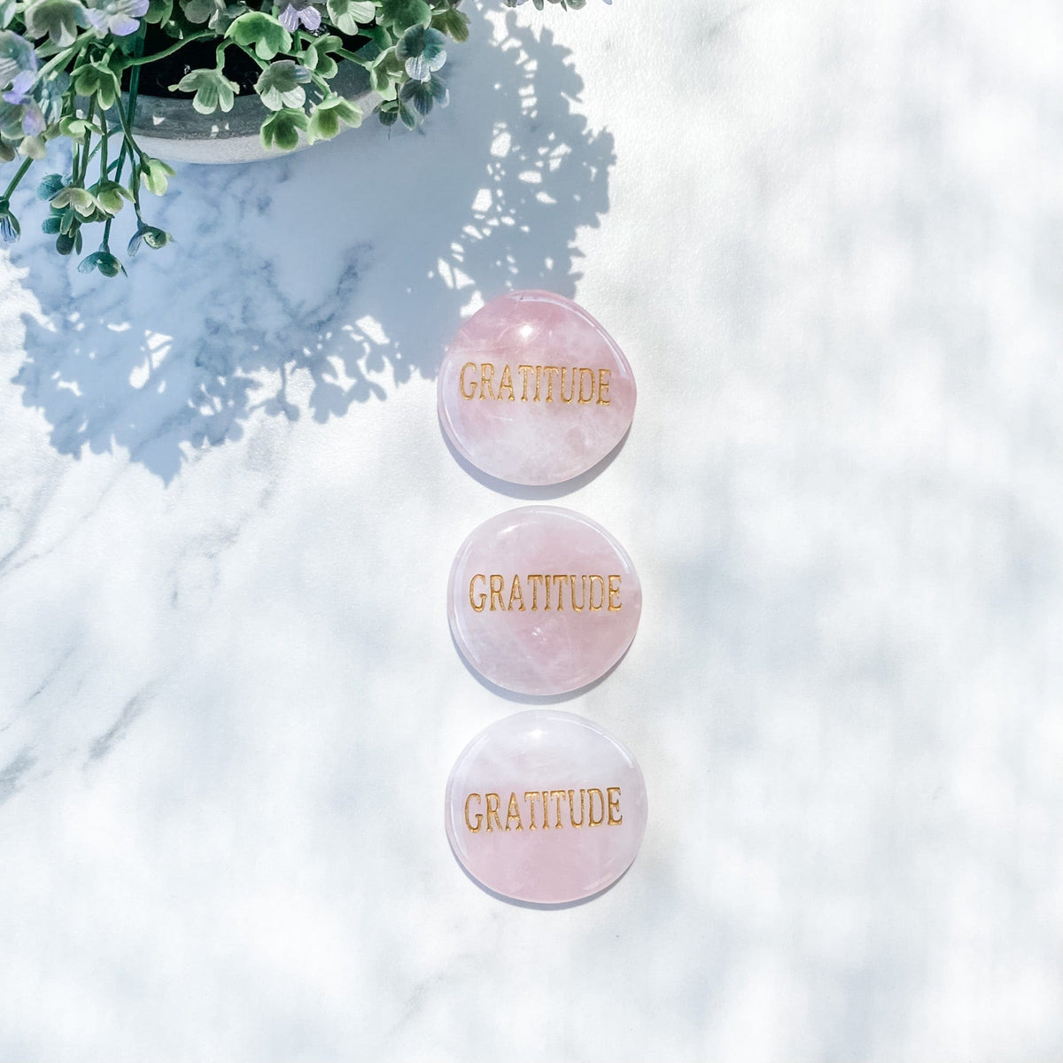 s1473 rose quartz crystal palm stone engraved with gold word gratitude australia. rose quartz palm stone inspirational wording australia gemrox sydney 1