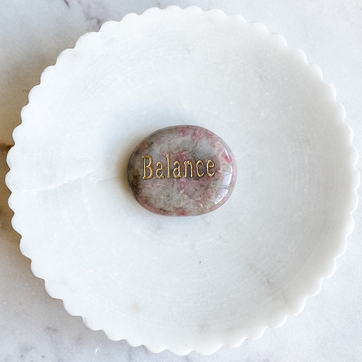 rhodonite crystal engraved word balance palmstone australia