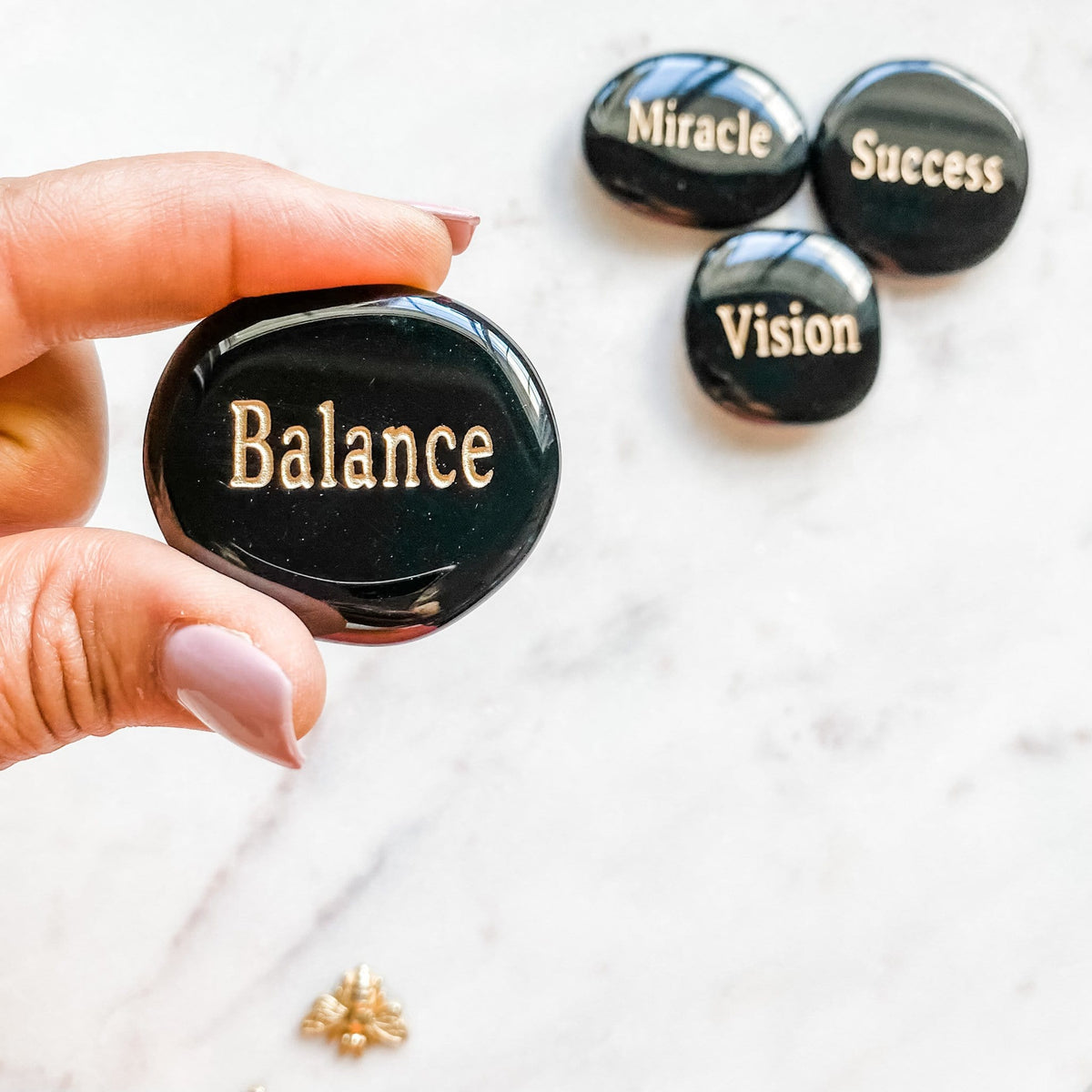 Black onyx inspirational engraved word palmstone balance