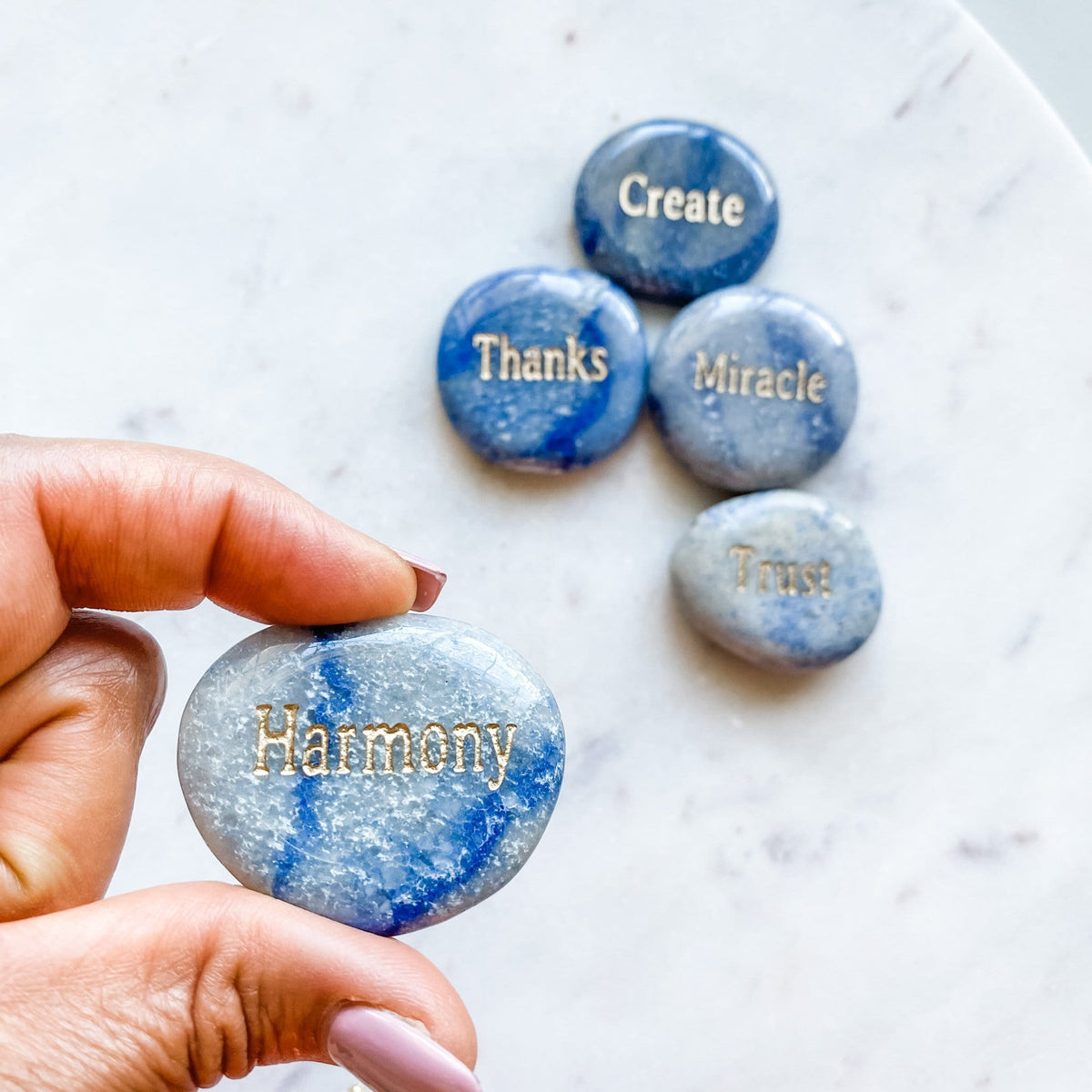 blue aventurine engraved inspirational word palmstone HARMONY