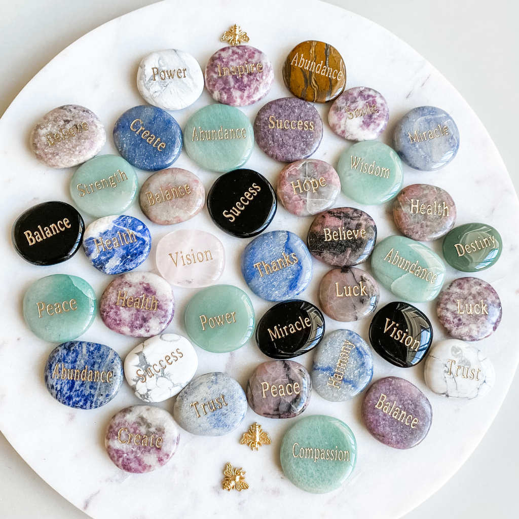 Palm stones with inspirational engraved word.engraved palm stones palmstones success wisdome abundance vision love word palmstones palm stones australia.Crystals and stones with words gold lettering.Worry stones.Meditation stones .Crystals australia gemro
