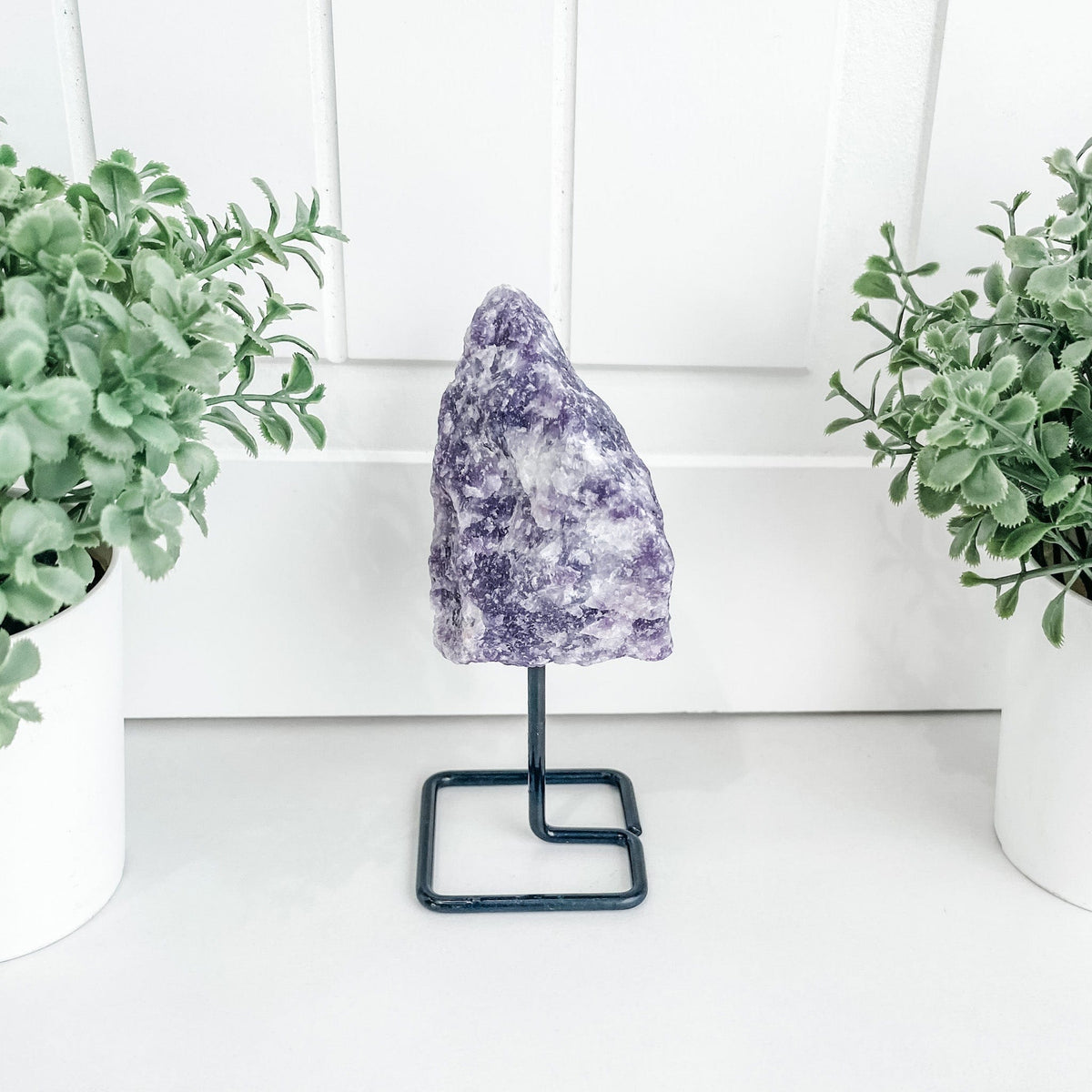 S1350 Raw Lepidolite crystal chunk stone on black metal stand australia.crystals australia. Lepidolite stand australia.gemrox sydney 1