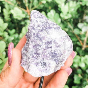 S1350 Raw Lepidolite crystal chunk stone on black metal stand australia.crystals australia. Lepidolite stand australia.gemrox sydney 1