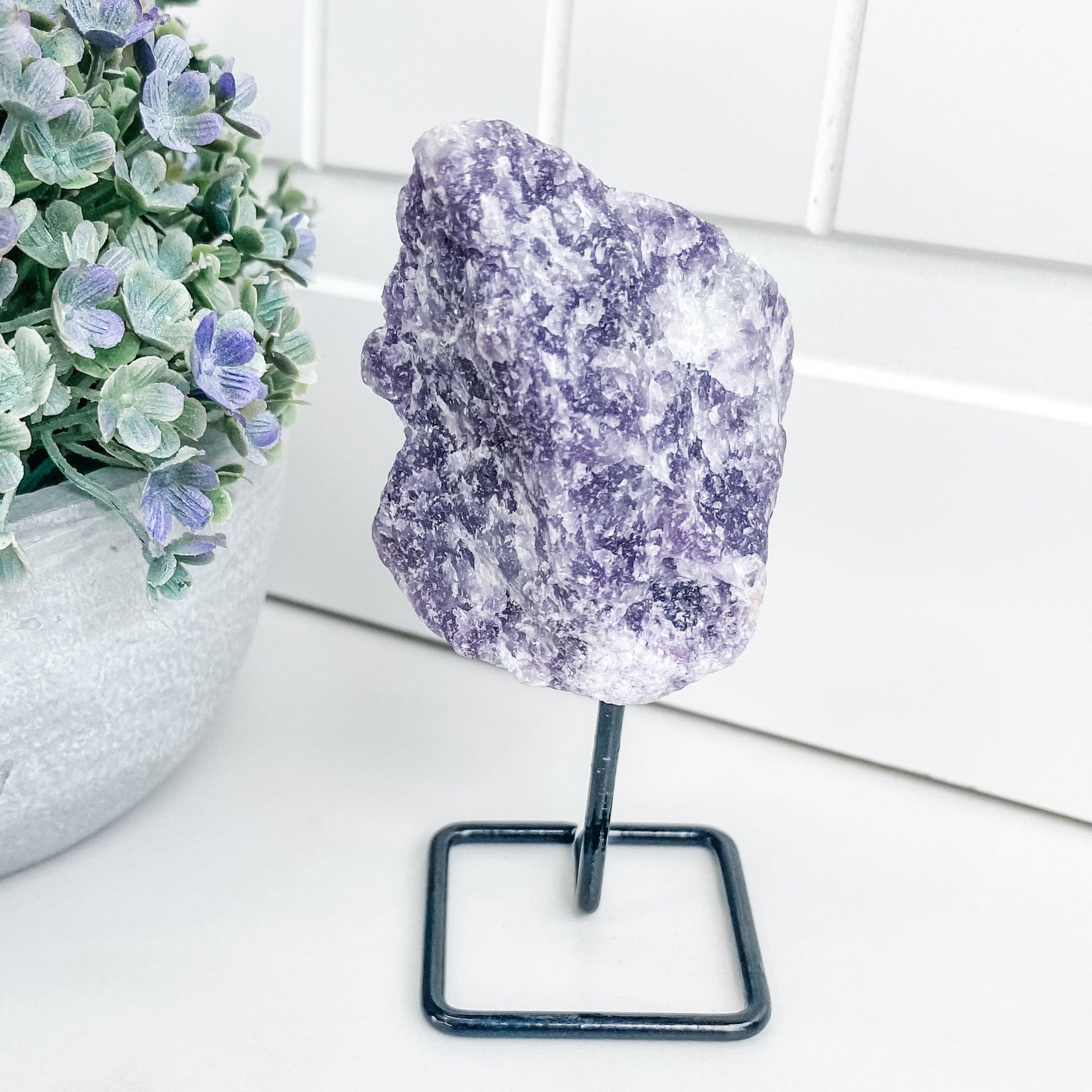 S1350 Raw Lepidolite crystal chunk stone on black metal stand australia.crystals australia. Lepidolite stand australia.gemrox sydney 1