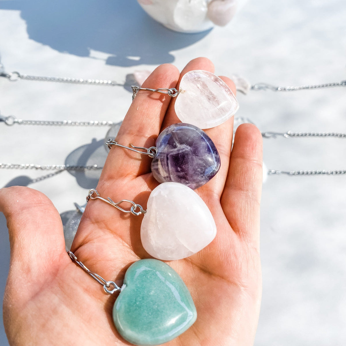 crystal heart polished stone tea strainer infuser rose quartz clear quartz green aventurine amethyst australia gemrox