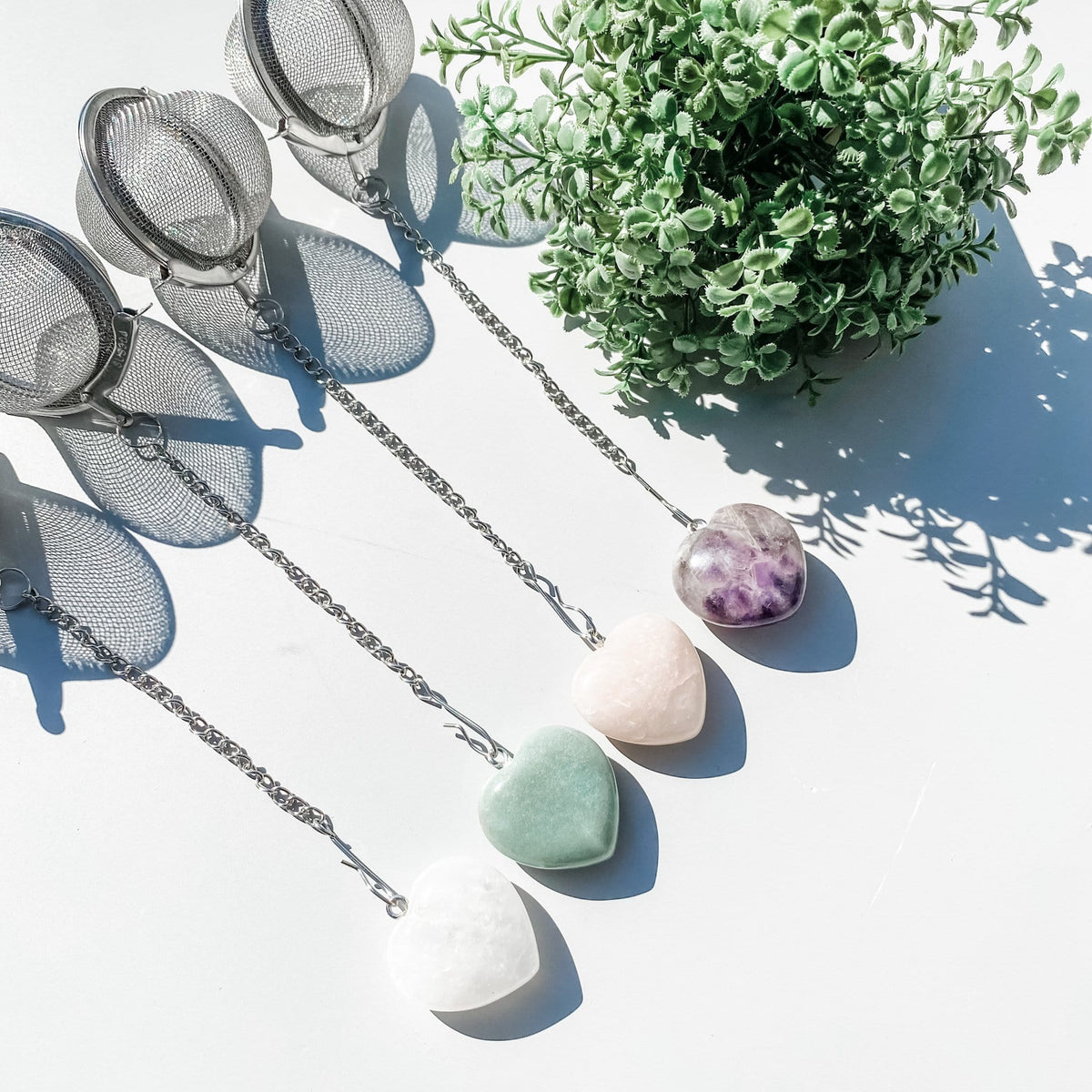 crystal heart polished stone tea strainer infuser rose quartz clear quartz green aventurine amethyst australia gemrox