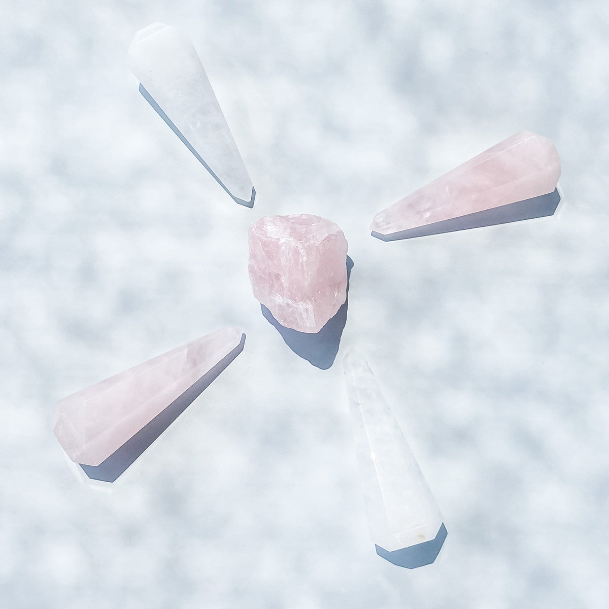 Rose quartz crystal ring stand ring holder tower point generator gemrox australia