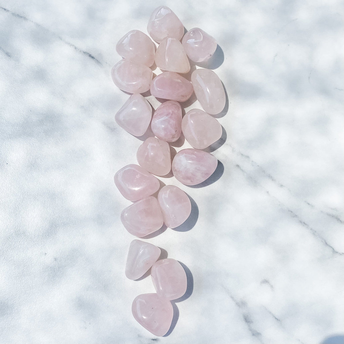 Rose Quartz crystal Tumbled stone gemrox australia.jpg