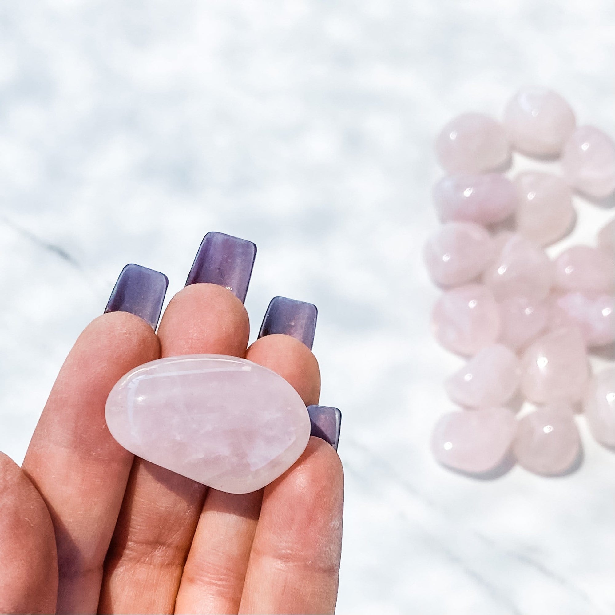 Rose Quartz crystal Tumbled stone gemrox australia.jpg