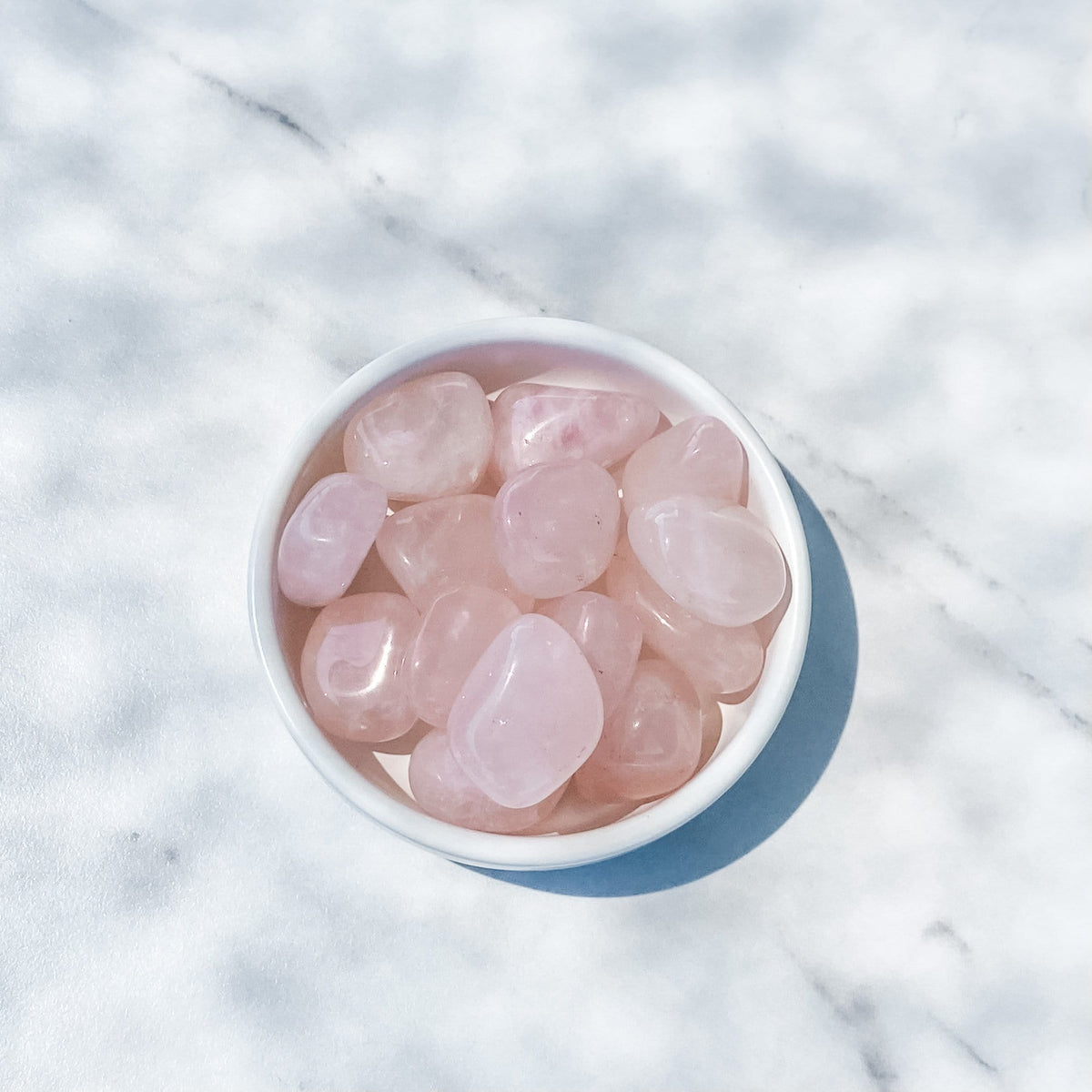 Rose Quartz crystal Tumbled stone gemrox australia.jpg