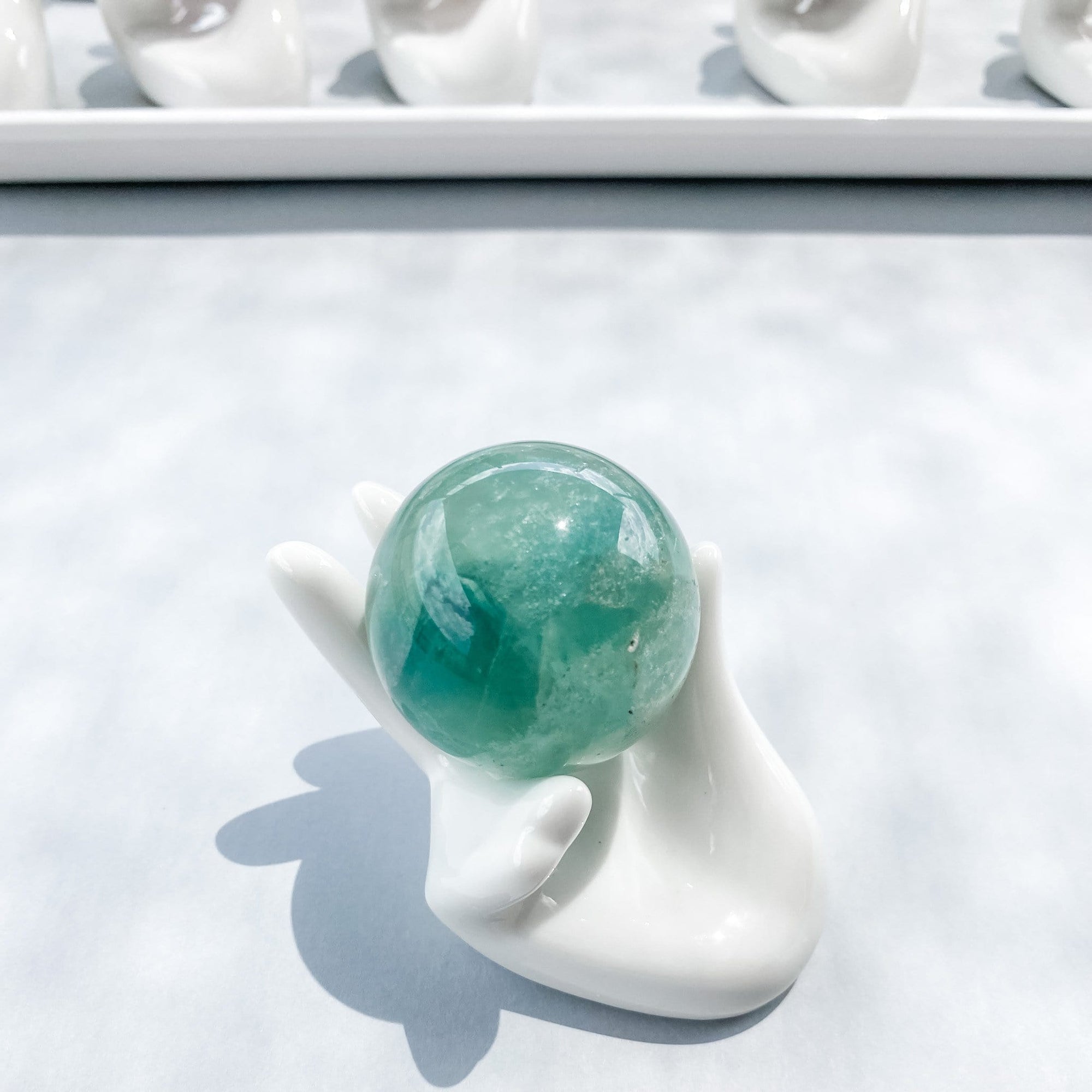 S945 White ceramic hand shaped crystal sphere stand holder gemrox australia