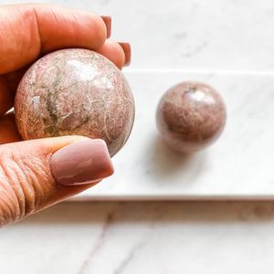 rhodonite crystal ball sphere healing stone australia