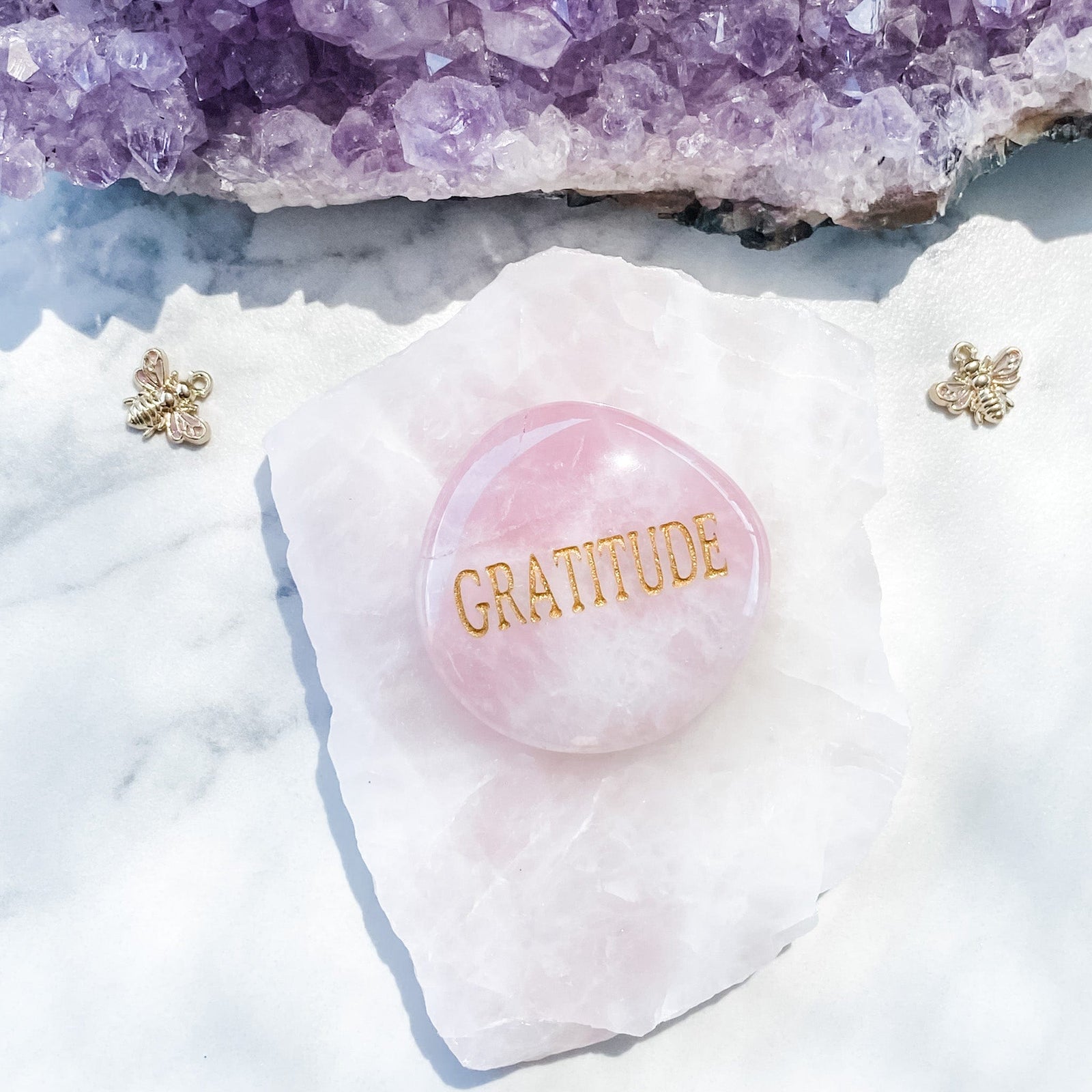 s1473 rose quartz crystal palm stone engraved with gold word gratitude australia. rose quartz palm stone inspirational wording australia gemrox sydney 1