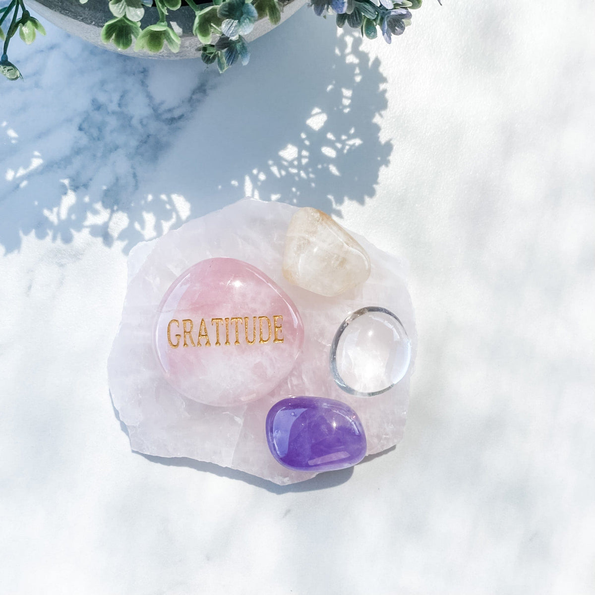 s1473 rose quartz crystal palm stone engraved with gold word gratitude australia. rose quartz palm stone inspirational wording australia gemrox sydney 1