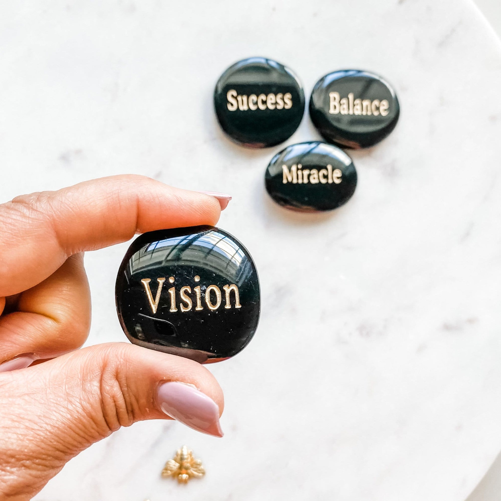 Black onyx engraved inspirational word palmstone vision