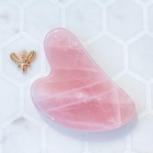rose quartz crystal heart shaped gua sha facial tool massaging anti aging australia