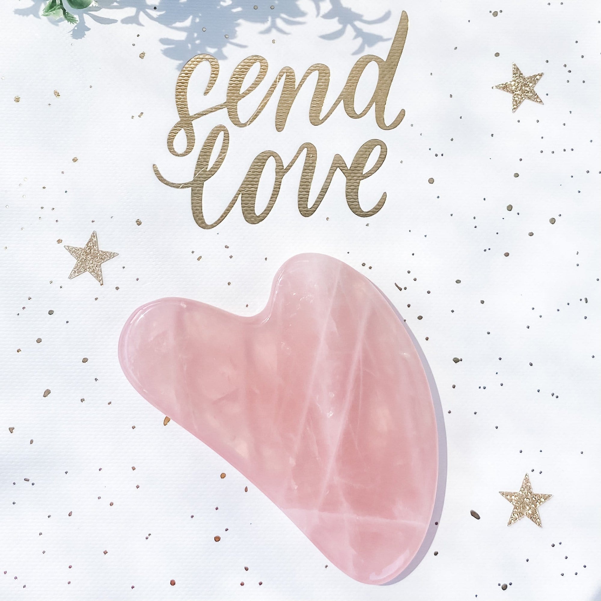 rose quartz crystal heart shaped stone gua sha tool gemrox australia